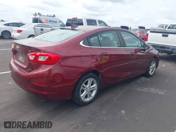 2016 Chevrolet Cruze LT z VIN 1G1BE5SM8G7244108, wystawiony jako IAAI lot #43344894 z przebiegiem 143 215 mil mil oraz . Historia ofert i sprzedaży dostępna na DreamBid. Obrazek 4.