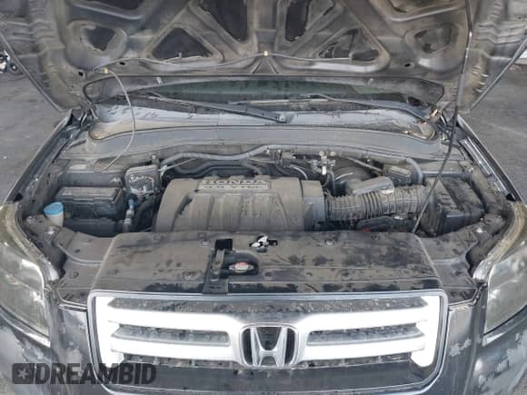 2006 Honda Pilot EX-L z VIN 2HKYF18526H501636, wystawiony jako IAAI lot #43389106 z przebiegiem 222 248 mil mil oraz . Historia ofert i sprzedaży dostępna na DreamBid. Obrazek 10.