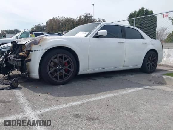 2007 Chrysler 300 C SRT-8 with VIN 2C3LA73W17H659735, listed as a IAAI auction lot 41688198 with 132,785 mi miles and . Bid and sale history available at DreamBid. Image 14.