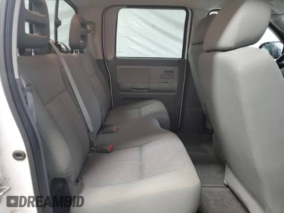 2007 Dodge Dakota SLT с VIN 1D7HE48P87S182418, выставлен на аукционе Copart как лот 58502375 с пробегом 78 305 миль миль и Списание • Salvage title. История ставок и продаж доступна на DreamBid. Изображение 10.
