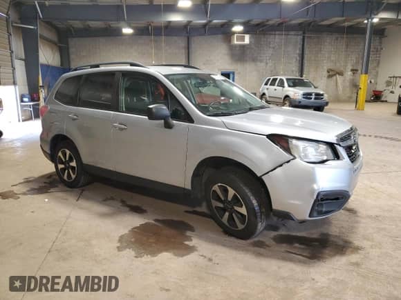 2017 Subaru Forester с VIN JF2SJABC2HH408727, выставлен на аукционе Copart как лот 63806945 с пробегом 262 731 миль миль и Списание • Salvage title. История ставок и продаж доступна на DreamBid. Изображение 4.