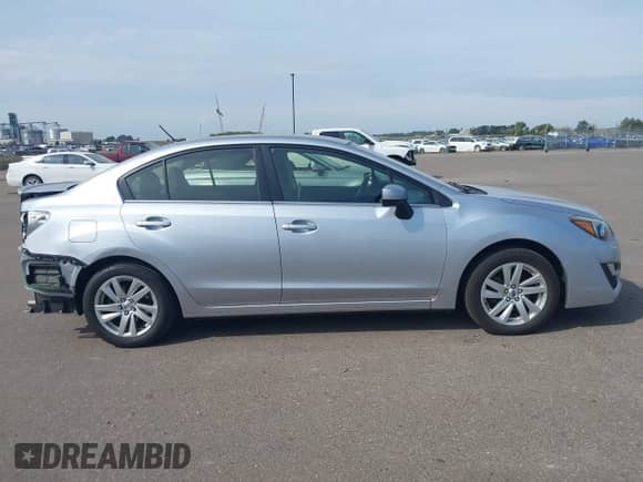 2016 Subaru Impreza Premium z VIN JF1GJAB64GH010521, wystawiony jako IAAI lot #43256482 z przebiegiem 44 264 mil mil oraz . Historia ofert i sprzedaży dostępna na DreamBid. Obrazek 14.