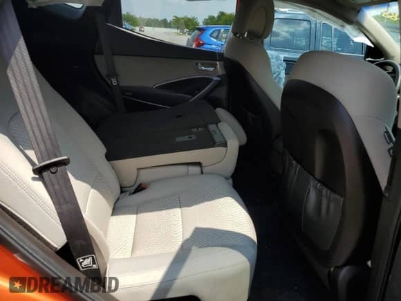 2015 Hyundai Santa Fe z VIN 5XYZT3LB0FG301688, wystawiony jako Copart lot #68935065 z przebiegiem 111 975 mil mil oraz Szkoda całkowita • Salvage title. Historia ofert i sprzedaży dostępna na DreamBid. Obrazek 11.