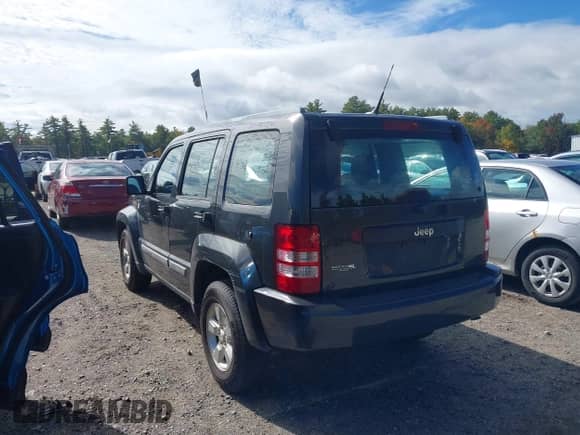 2011 Jeep Liberty Sport with VIN 1J4PN2GK7BW536702, listed as a IAAI auction lot 43309648 with 124,736 mi miles and . Bid and sale history available at DreamBid. Image 3.