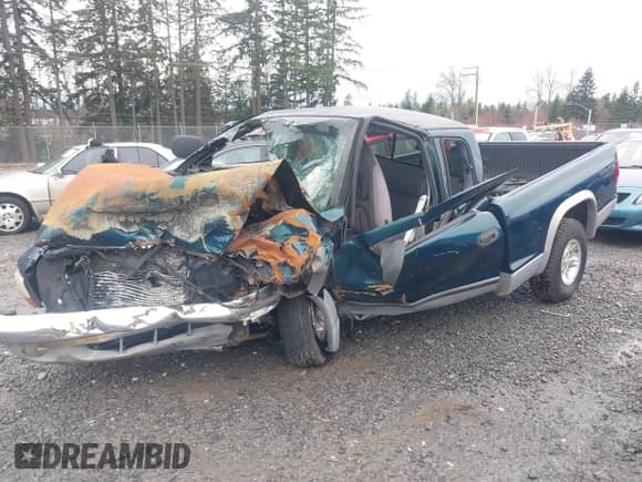 1997 Dodge Dakota z VIN 1B7GG23X9VS242604, wystawiony jako IAAI lot #41772203 z przebiegiem Nie podano mil oraz . Historia ofert i sprzedaży dostępna na DreamBid. Obrazek 16.