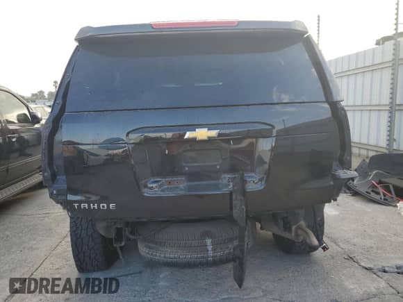 2019 Chevrolet Tahoe LT with VIN 1GNSKBKC2KR400539, listed as a Copart auction lot 80126955 with 97,049 mi miles and Salvage title. Bid and sale history available at DreamBid. Image 6.