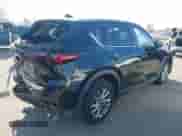 2022 Mazda CX-5 S Select z VIN JM3KFBBMXN0624955, wystawiony jako IAAI lot #43335876 z przebiegiem 77 689 mil mil oraz . Historia ofert i sprzedaży dostępna na DreamBid. Obrazek 4.