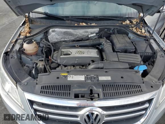 2011 Volkswagen Tiguan S с VIN WVGAV7AX7BW557154, выставлен на аукционе Copart как лот 87455645 с пробегом 112 379 миль миль и Списание • Salvage title. История ставок и продаж доступна на DreamBid. Изображение 12.