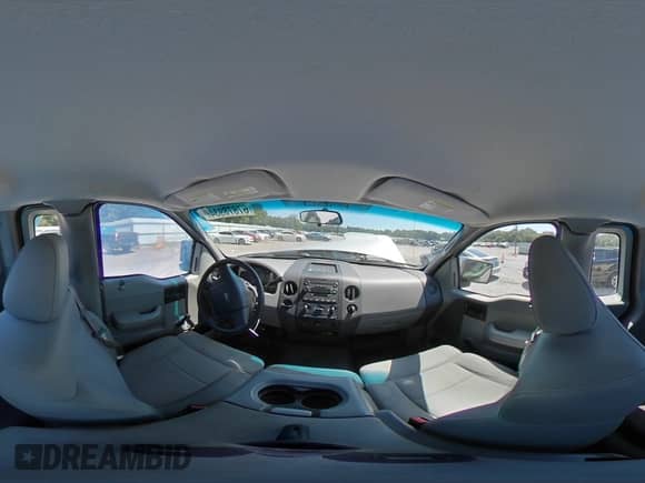 2004 Ford F-150 STX z VIN 1FTRF02WX4KD86718, wystawiony jako Copart lot #67878934 z przebiegiem 216 170 mil mil oraz Szkoda całkowita • Salvage title. Historia ofert i sprzedaży dostępna na DreamBid. Obrazek 13.