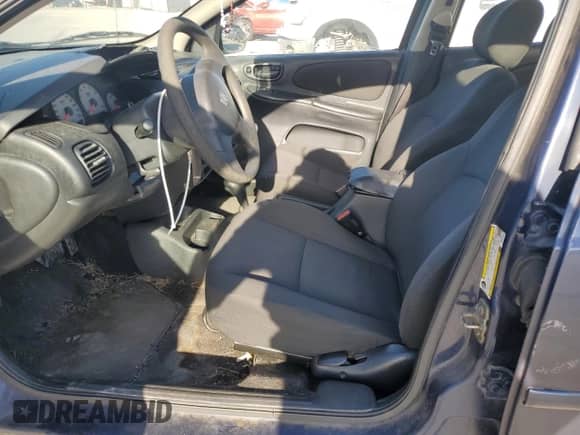 2005 Dodge Neon SXT with VIN 1B3ES56C45D267819, listed as a Copart auction lot 81245634 with 243,839 mi miles and Salvage title. Bid and sale history available at DreamBid. Image 7.