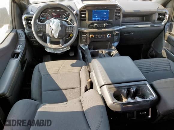 2022 Ford F-150 XL с VIN 1FTEW1CP6NKD77771, выставлен на аукционе Copart как лот 69917415 с пробегом 80 383 миль миль и Списание • Salvage title. История ставок и продаж доступна на DreamBid. Изображение 8.