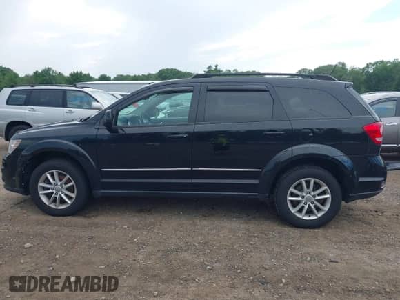 2017 Dodge Journey SXT with VIN 3C4PDDBG0HT515163, listed as a IAAI auction lot 42711370 with 102,440 mi miles and . Bid and sale history available at DreamBid. Image 14.