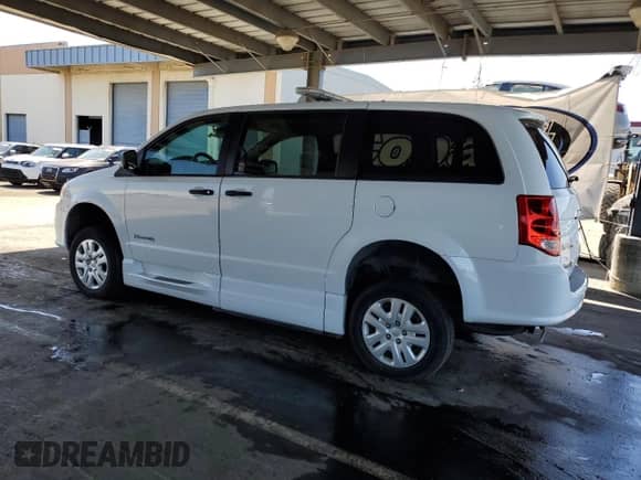 2019 Dodge Grand Caravan SE with VIN 2C7WDGBG1KR740301, listed as a Copart auction lot 62907865 with 64,667 mi miles and Clean title. Bid and sale history available at DreamBid. Image 2.