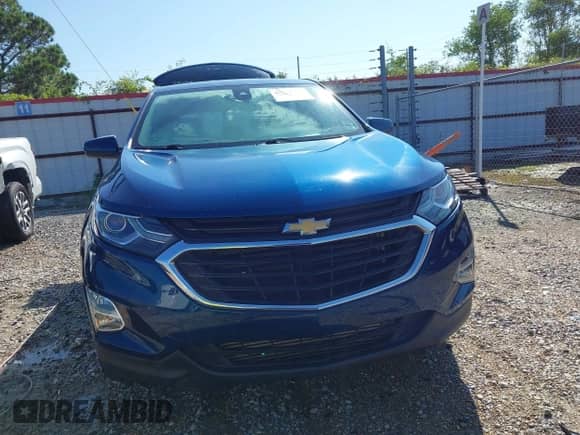 2021 Chevrolet Equinox LT with VIN 3GNAXKEV5ML324352, listed as a IAAI auction lot 43318989 with 33,049 mi miles and . Bid and sale history available at DreamBid. Image 13.