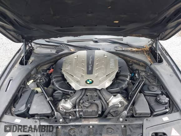 2011 BMW 5 Series 550i xDrive with VIN WBAFU9C50BC784818, listed as a IAAI auction lot 42313290 with 96,348 mi miles and . Bid and sale history available at DreamBid. Image 10.