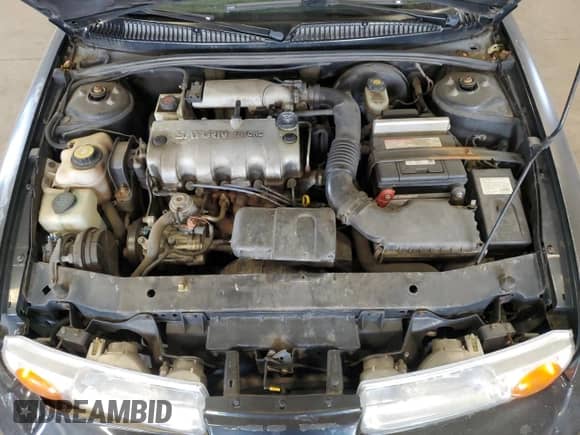 2002 Saturn SL с VIN 1G8ZH52812Z300140, выставлен на аукционе Copart как лот 61628415 с пробегом 133 340 миль миль и Списание • Salvage title. История ставок и продаж доступна на DreamBid. Изображение 11.