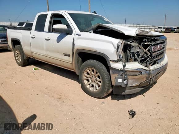 2018 GMC Sierra 1500 SLE с VIN 1GTV2MEC4JZ267892, выставлен на аукционе Copart как лот 72064455 с пробегом 260 785 миль миль и Списание • Salvage title. История ставок и продаж доступна на DreamBid. Изображение 4.