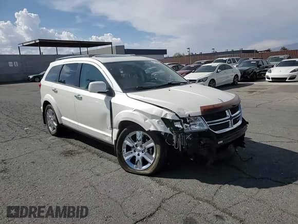 2015 Dodge Journey Limited с VIN 3C4PDDDG1FT725538, выставлен на аукционе Copart как лот 71289665 с пробегом 129 159 миль миль и Списание • Salvage title. История ставок и продаж доступна на DreamBid. Изображение 13.