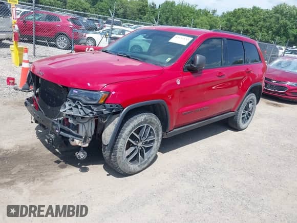 2017 Jeep Grand Cherokee Trailhawk z VIN 1C4RJFLT8HC693715, wystawiony jako IAAI lot #42531133 z przebiegiem 128 250 mil mil oraz . Historia ofert i sprzedaży dostępna na DreamBid. Obrazek 2.
