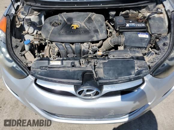 2011 Hyundai Elantra GLS z VIN KMHDH4AE7BU154997, wystawiony jako Copart lot #66558955 z przebiegiem 165 913 mil mil oraz Szkoda całkowita • Salvage title. Historia ofert i sprzedaży dostępna na DreamBid. Obrazek 11.