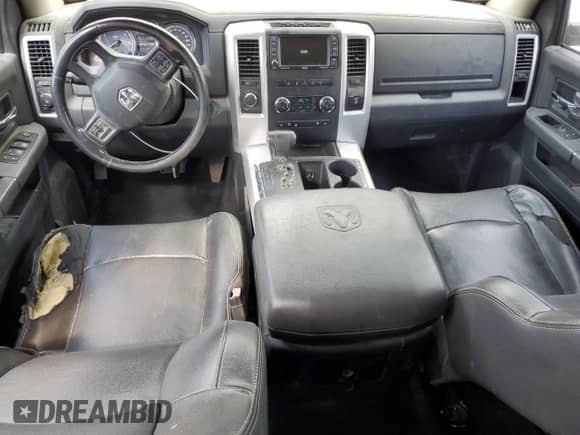 2012 Ram 1500 Sport z VIN 1C6RD7MT9CS152772, wystawiony jako Copart lot #68469075 z przebiegiem 210 564 mil mil oraz Szkoda całkowita • Salvage title. Historia ofert i sprzedaży dostępna na DreamBid. Obrazek 8.