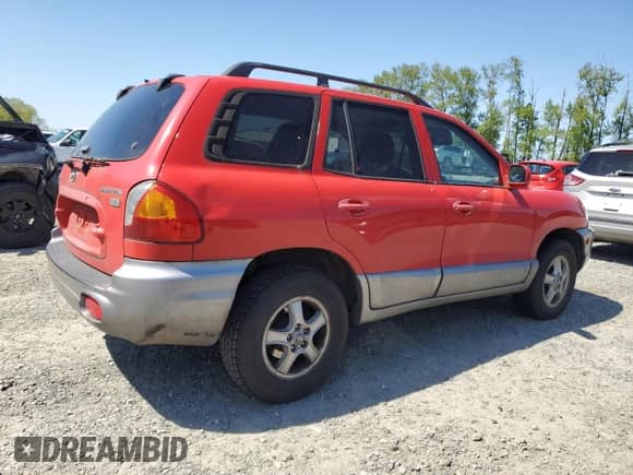 2003 Hyundai Santa Fe GLS z VIN KM8SC13E43U516996, wystawiony jako Copart lot #54864075 z przebiegiem 182 463 mil mil oraz Szkoda całkowita • Salvage title. Historia ofert i sprzedaży dostępna na DreamBid. Obrazek 3.