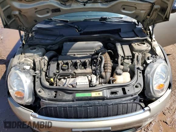 2010 MINI Hardtop S with VIN WMWMF7C58ATZ70756, listed as a Copart auction lot 81047265 with 95,643 mi miles and Salvage title. Bid and sale history available at DreamBid. Image 11.