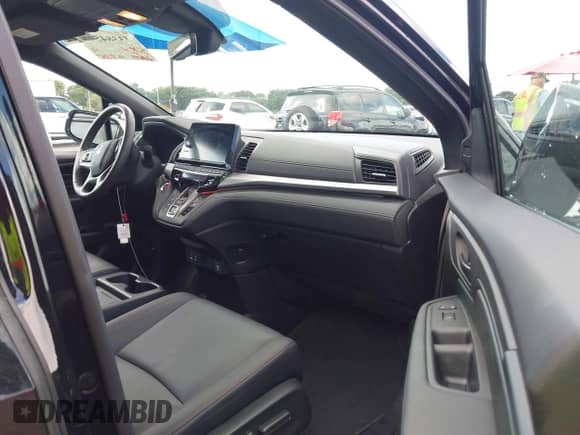 2025 Honda Odyssey Sport-L z VIN 5FNRL6H79SB049785, wystawiony jako IAAI lot #43384548 z przebiegiem 4 405 mil mil oraz . Historia ofert i sprzedaży dostępna na DreamBid. Obrazek 5.