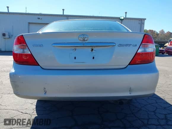 2002 Toyota Camry LE z VIN 4T1BE32K12U051024, wystawiony jako IAAI lot #43323194 z przebiegiem 173 974 mil mil oraz . Historia ofert i sprzedaży dostępna na DreamBid. Obrazek 17.