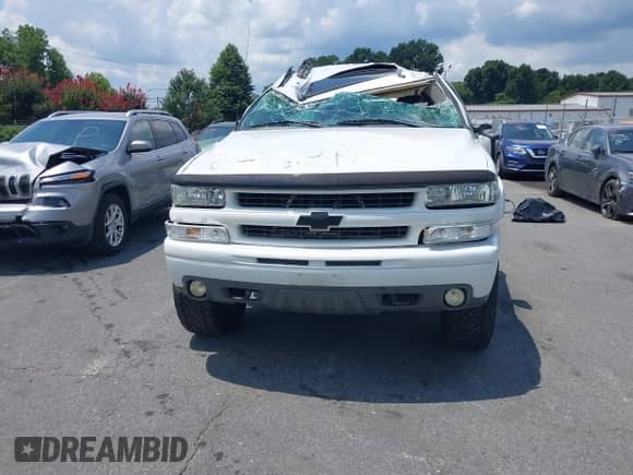 2004 Chevrolet Tahoe Z71 z VIN 1GNEK13Z84R105328, wystawiony jako IAAI lot #42850218 z przebiegiem 255 160 mil mil oraz . Historia ofert i sprzedaży dostępna na DreamBid. Obrazek 12.