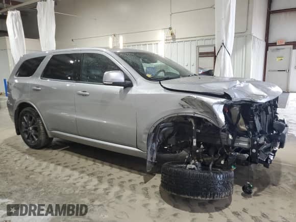 2016 Dodge Durango R/T with VIN 1C4SDJCT5GC341265, listed as a Copart auction lot 82257175 with 105,859 mi miles and Salvage title. Bid and sale history available at DreamBid. Image 4.