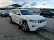 2015 Jeep Grand Cherokee Overland z VIN 1C4RJECG6FC734840, wystawiony jako Copart lot #69043835 z przebiegiem 193 893 mil mil oraz Szkoda całkowita • Salvage title. Historia ofert i sprzedaży dostępna na DreamBid. Obrazek 13.