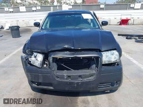 2006 Chrysler 300 C SRT-8 with VIN 2C3LA73W86H518966, listed as a IAAI auction lot 42725107 with 175,474 mi miles and . Bid and sale history available at DreamBid. Image 13.