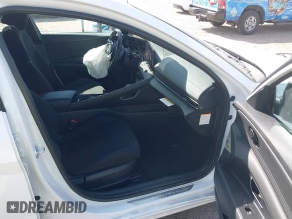 2025 Hyundai Elantra Blue with VIN KMHLM4DJ0SU123350, listed as a IAAI auction lot 41536867 with 6,077 mi miles and . Bid and sale history available at DreamBid. Image 5.