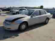 2000 Saturn LS with VIN 1G8JW52R0YY636923, listed as a Copart auction lot 62186235 with 335,017 mi miles and Salvage title. Bid and sale history available at DreamBid. Image 1.
