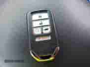 2022 Honda Pilot Touring 7-Passenger z VIN 5FNYF5H66NB034248, wystawiony jako IAAI lot #41777362 z przebiegiem 26 611 mil mil oraz . Historia ofert i sprzedaży dostępna na DreamBid. Obrazek 11.