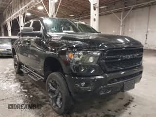 2022 Ram 1500 Big Horn with VIN 1C6SRFFM5NN384807, listed as a IAAI auction lot 41581726 with 11,627 mi miles and . Bid and sale history available at DreamBid. Image 1.