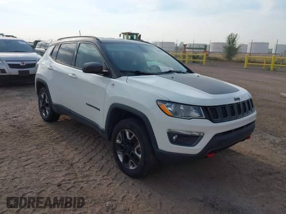 2018 Jeep Compass Trailhawk z VIN 3C4NJDDB8JT234574, wystawiony jako IAAI lot #43049041 z przebiegiem 93 968 mil mil oraz . Historia ofert i sprzedaży dostępna na DreamBid. Obrazek 1.
