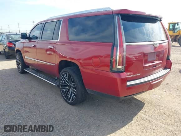 2015 Cadillac Escalade ESV Platinum with VIN 1GYS4UKJ0FR711819, listed as a IAAI auction lot 42997313 with 210,749 mi miles and . Bid and sale history available at DreamBid. Image 3.
