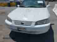 1997 Toyota Camry LE z VIN 4T1BF22K2VU921133, wystawiony jako IAAI lot #42601464 z przebiegiem 221 941 mil mil oraz . Historia ofert i sprzedaży dostępna na DreamBid. Obrazek 6.