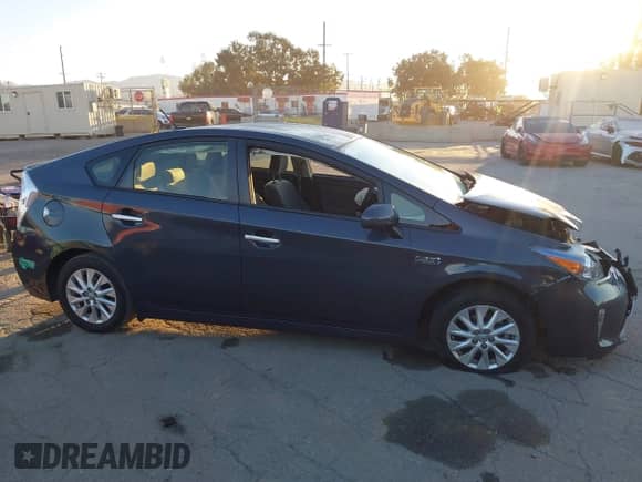 2015 Toyota Prius Advanced z VIN JTDKN3DP5F3068188, wystawiony jako IAAI lot #43475178 z przebiegiem 74 883 mil mil oraz . Historia ofert i sprzedaży dostępna na DreamBid. Obrazek 13.