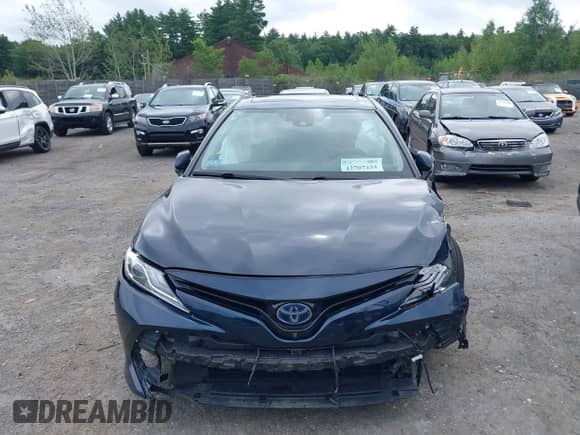 2020 Toyota Camry Hybrid XLE z VIN 4T1F31AK7LU521801, wystawiony jako IAAI lot #42707425 z przebiegiem 66 573 mil mil oraz . Historia ofert i sprzedaży dostępna na DreamBid. Obrazek 12.