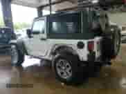 2013 Jeep Wrangler Rubicon 10th Anniversary with VIN 1C4BJWCGXDL543958, listed as a Copart auction lot 58492255 with 94,455 mi miles and Salvage title. Bid and sale history available at DreamBid. Image 2.