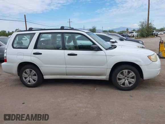 2008 Subaru Forester X with VIN JF1SG636X8H703048, listed as a IAAI auction lot 43432387 with 97,286 mi miles and . Bid and sale history available at DreamBid. Image 13.