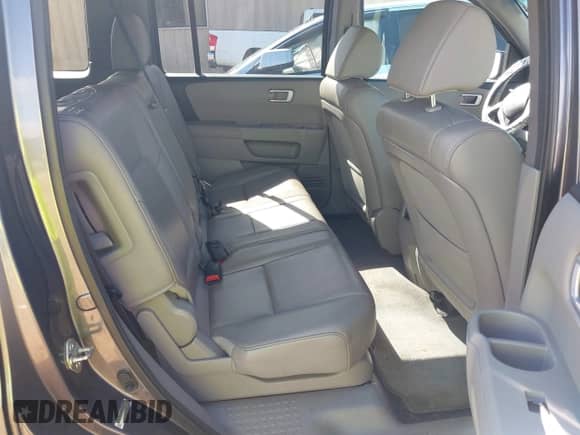 2014 Honda Pilot EX-L z VIN 5FNYF4H58EB016710, wystawiony jako IAAI lot #43349794 z przebiegiem 163 710 mil mil oraz . Historia ofert i sprzedaży dostępna na DreamBid. Obrazek 8.