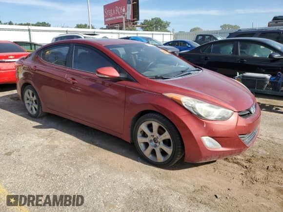 2012 Hyundai Elantra Limited with VIN KMHDH4AE6CU244837, listed as a Copart auction lot 62661995 with 136,448 mi miles and Salvage title. Bid and sale history available at DreamBid. Image 4.