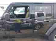 2023 Jeep Wrangler Sport S with VIN 1C4HJXDN6PW599895, listed as a IAAI auction lot 42242107 with 53,980 mi miles and . Bid and sale history available at DreamBid. Image 14.