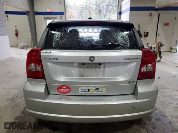 2010 Dodge Caliber SXT with VIN 1B3CB4HA6AD544462, listed as a Copart auction lot 81085784 with 20,467 mi miles and Salvage title. Bid and sale history available at DreamBid. Image 6.