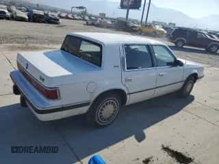 1993 Dodge Dynasty с VIN 1B3XC4632PD153627, выставлен на аукционе Copart как лот 75645834 с пробегом 199 336 миль миль и Списание • Salvage title. История ставок и продаж доступна на DreamBid. Изображение 3.