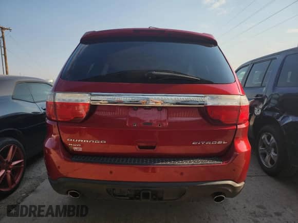 2011 Dodge Durango Citadel with VIN 1D4SE5GT5BC695099, listed as a Copart auction lot 68176855 with 220,540 mi miles and Salvage title. Bid and sale history available at DreamBid. Image 6.